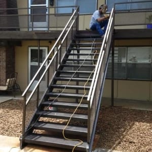 Final touches on a steel stair case