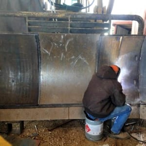 A member of our team working on a vent system