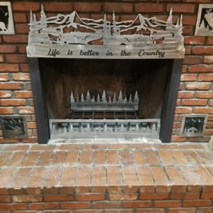 Hearth of a fire place reads 