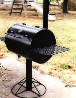 A shiny black grill ready to use